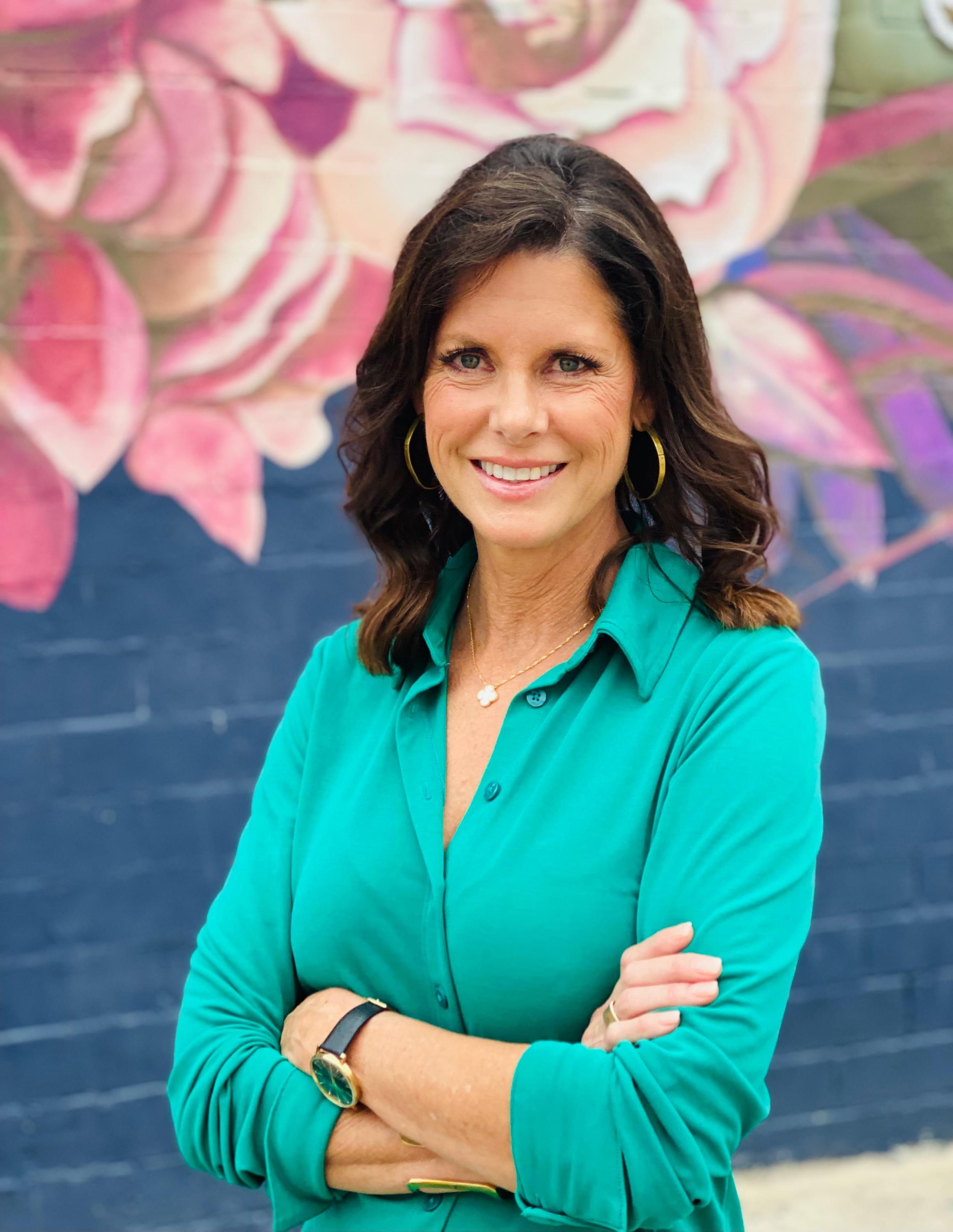 photo of public speaker entrpreneur Sara Moses smiling